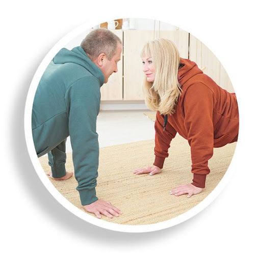 Couple doing push-ups together realize physical activity is one of the essentials of diabetes care.u00a9Twenty20