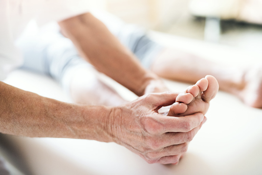 diabetes feet physiotherapist working on foot